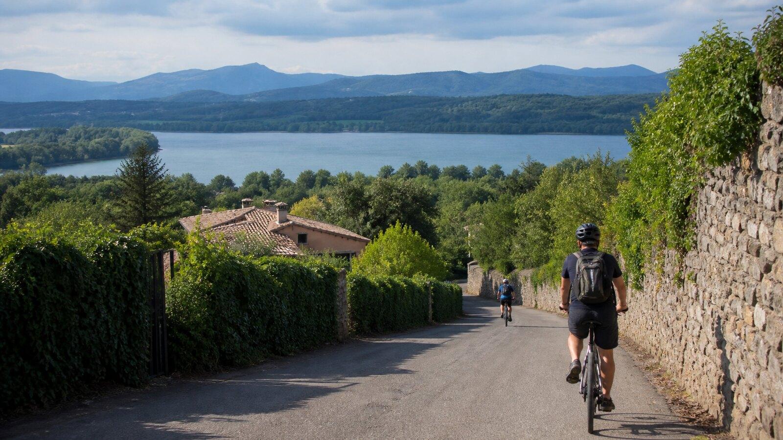 Road descent with Lake Banyoles visible in the distance