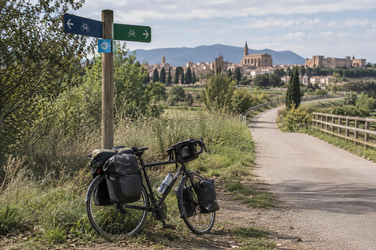 Touring bicycle at a signed Pirinexus junction near Figueres